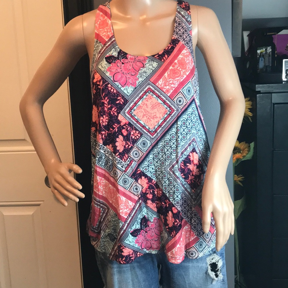 Maurice’s size medium flowy razor back tank